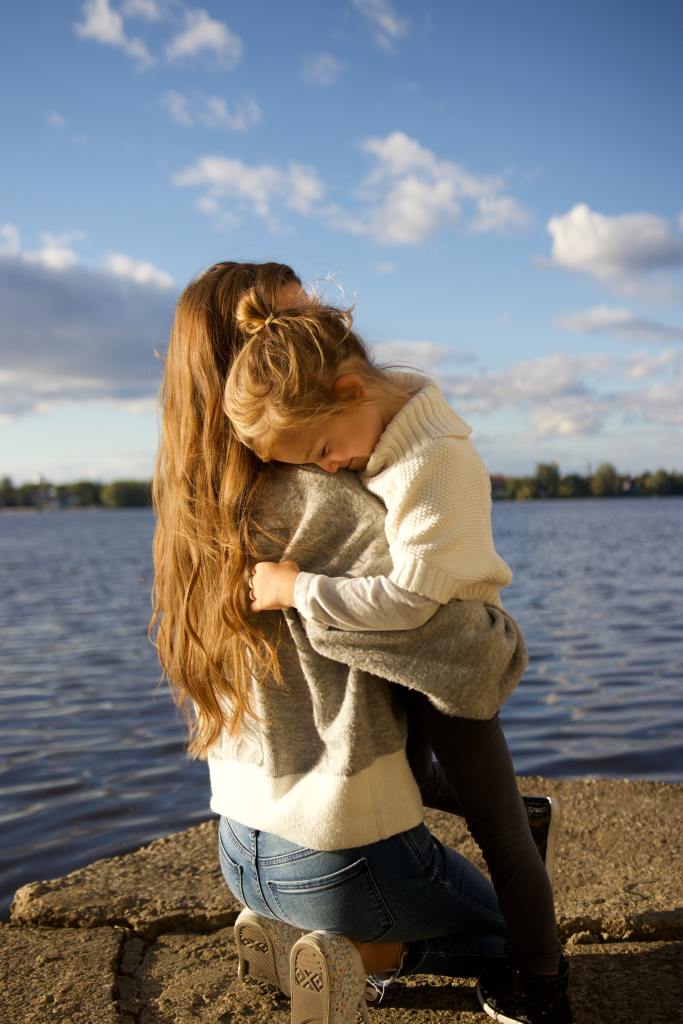 mom hugging child