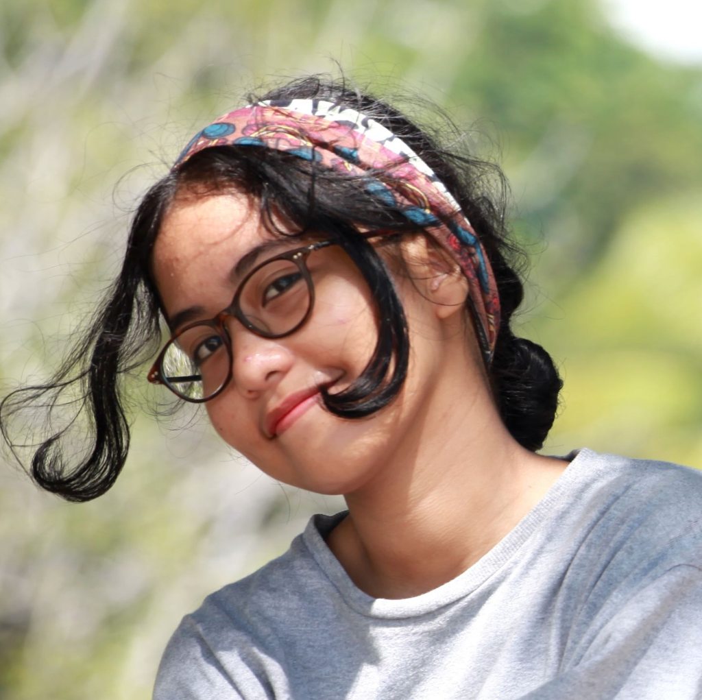 Sister with glasses and headband